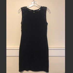 Body-con black mini-dress with lace trim